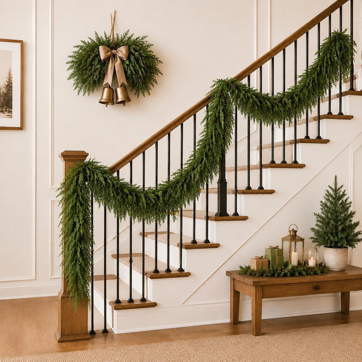 Green artificial garland displayed along a staircase railing.