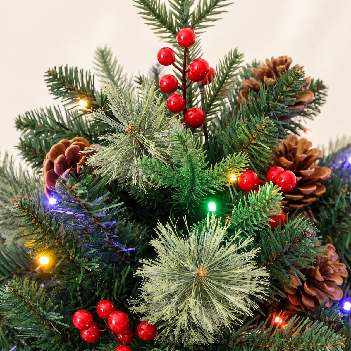 Close-up of mixed green needles, red berry clusters, pinecones, and multicolor lights on the Christmas urn filler. AI-generated detail illustration based on the original product image.