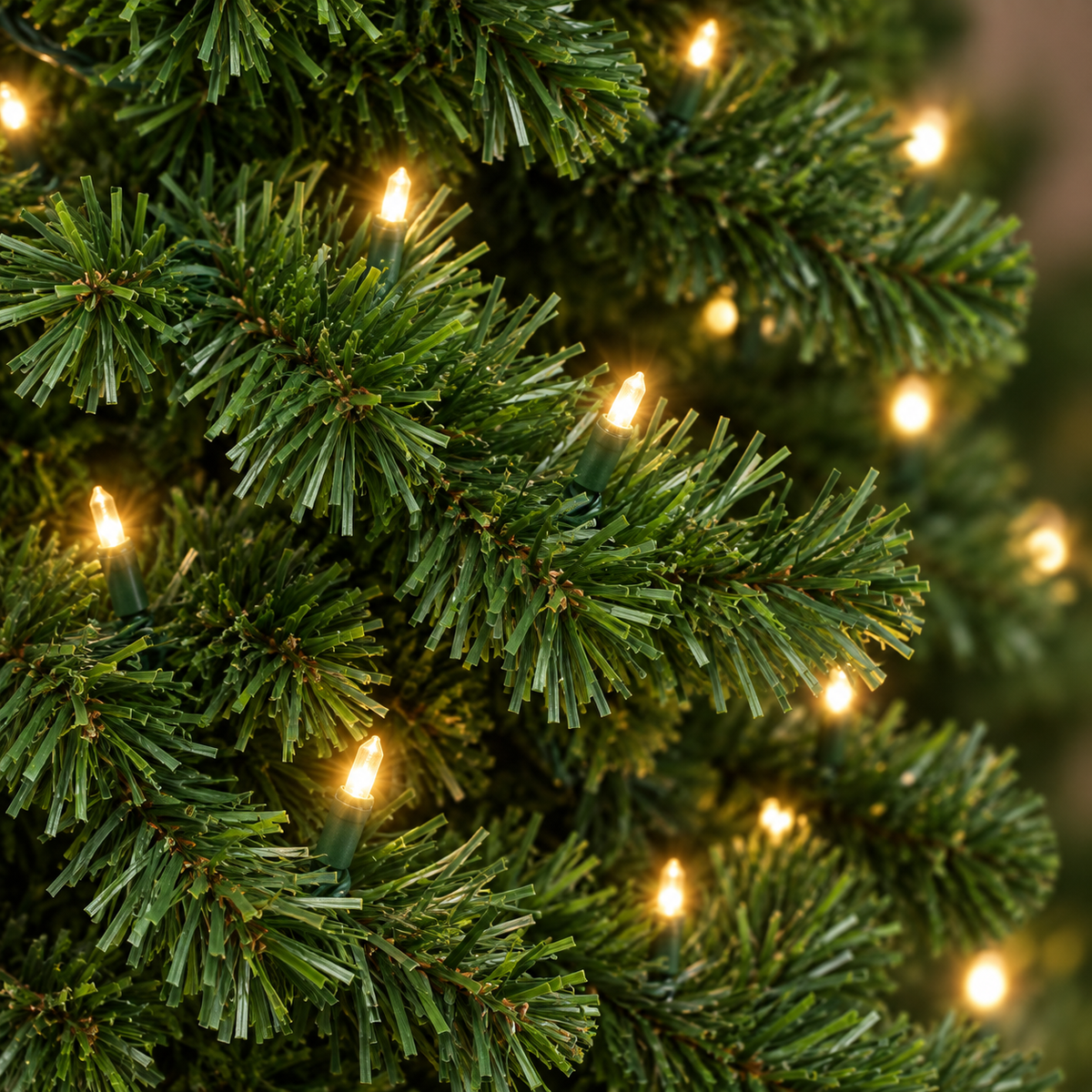 AI-generated illustrative close-up of green artificial branches and warm white lights based on the DRNEWI pencil tree reference; fine details are illustrative.